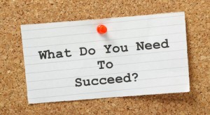 What do you need to succeed index card pinned to corkboard