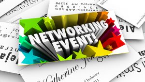 Networking Event words on a business card on a stack of contacts collected at a mixer, meeting, seminar, conference or convention